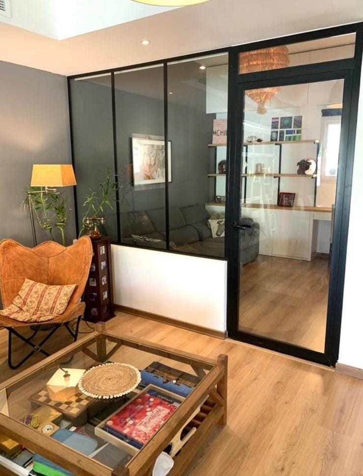 Custom aluminium and glass entrance door installed with matte black finish in Dubai residential property